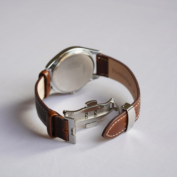 Vlindersluiting horloge openen sales
